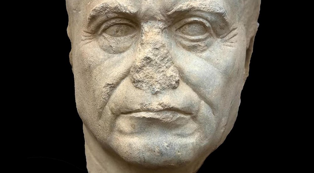 marble head of a statue depicting an elderly man from the Ptolemaic Period